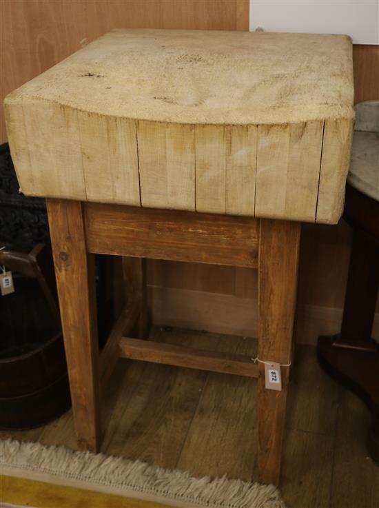A butchers block on stand